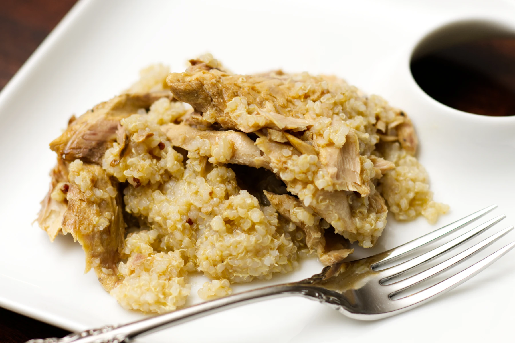 Quinoa and Mackerel on a plate with a fork