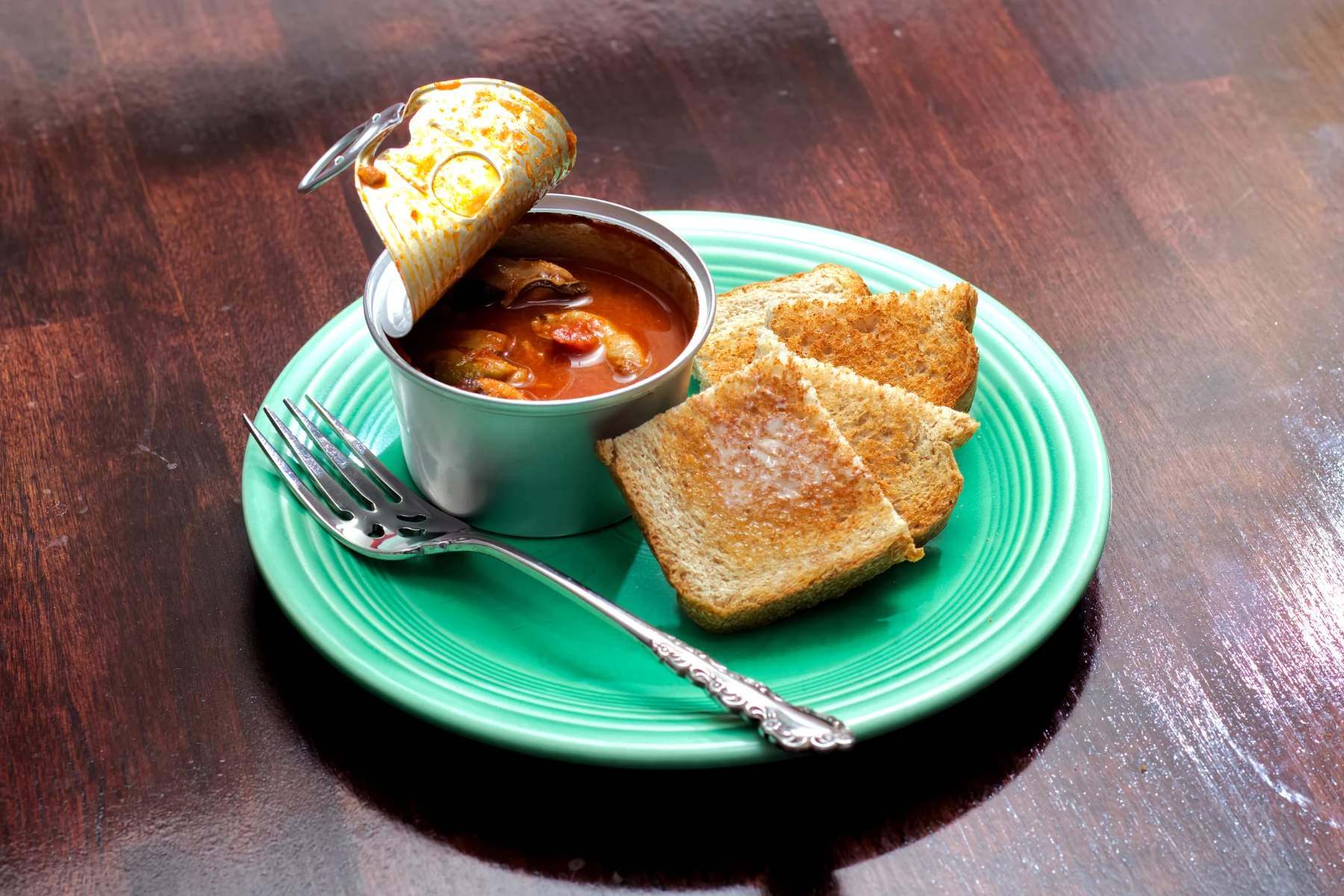Opened can with some toast squares